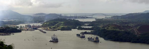 Central America: Aerial View Of The Panama Canal Featuring The Miraflores Locks And Bridge Of Americas by Panoramic Images