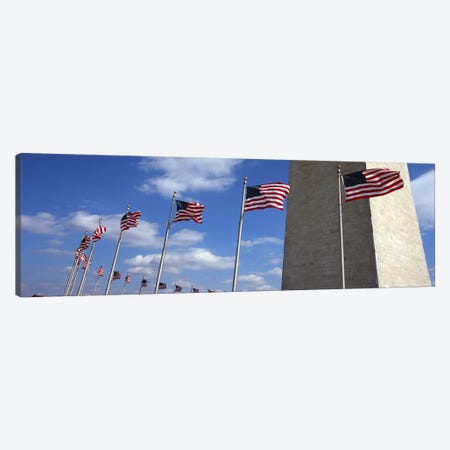American Flags Flapping In The Wind, Washington Monument, National Mall, Washington, D.C., USA Canvas Print #PIM7651} by Panoramic Images Canvas Artwork