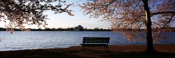 Washington, D.C.: Park bench with a memorial in the background, Jefferson Memorial, Tidal Basin, Potomac River, Washington DC, USA by Panoramic Images