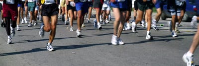 Low section view of people running in a marathonChicago Marathon, Chicago, Illinois, USA by Panoramic Images multi panel art