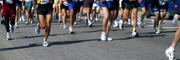 Fitness: Low section view of people running in a marathonChicago Marathon, Chicago, Illinois, USA by Panoramic Images