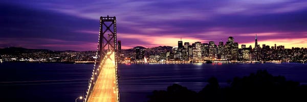 San Francisco: Bridge lit up at dusk, Bay Bridge, San Francisco Bay, San Francisco, California, USA by Panoramic Images