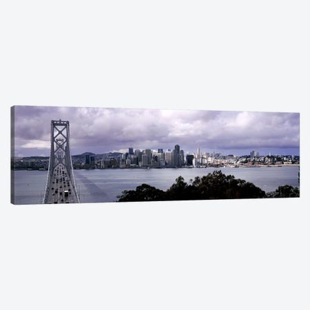 Bridge across a bay with city skyline in the background, Bay Bridge, San Francisco Bay, San Francisco, California, USA #2 Canvas Print #PIM7838} by Panoramic Images Canvas Art
