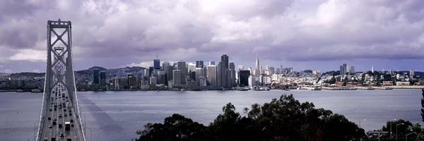 San Francisco Skylines: Bridge across a bay with city skyline in the background, Bay Bridge, San Francisco Bay, San Francisco, California, USA #2 by Panoramic Images