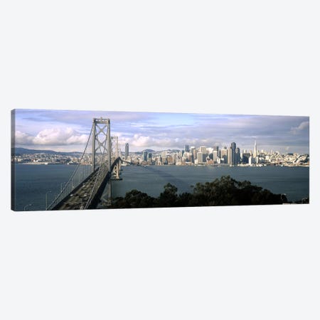 Bridge across a bay with city skyline in the background, Bay Bridge, San Francisco Bay, San Francisco, California, USA #3 Canvas Print #PIM7839} by Panoramic Images Canvas Wall Art