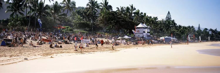 Tourists on the beach, North Shore, Oahu, Hawaii, USA