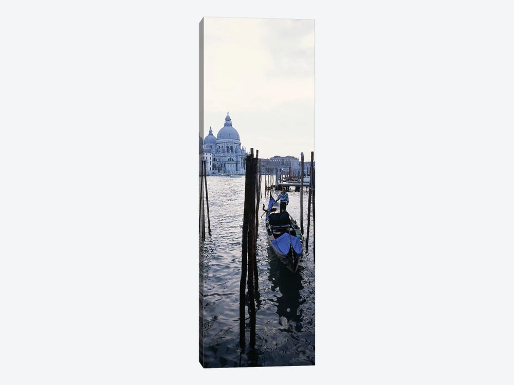 Gondolier in a gondola with a cathedral in the background, Santa Maria Della Salute, Venice, Veneto, Italy by Panoramic Images 1-piece Canvas Wall Art