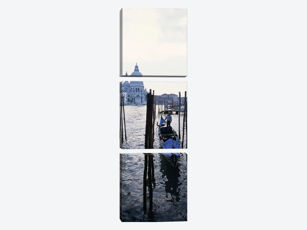 Gondolier in a gondola with a cathedral in the background, Santa Maria Della Salute, Venice, Veneto, Italy by Panoramic Images 3-piece Canvas Artwork