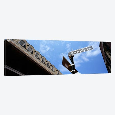 Street name signboard on a pole, Bourbon Street, French Market, French Quarter, New Orleans, Louisiana, USA Canvas Print #PIM7901} by Panoramic Images Canvas Wall Art