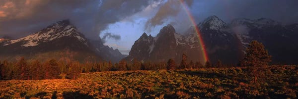 Rocky Mountains: Sunrise & rainbow Grand Teton National Park WY USA by Panoramic Images