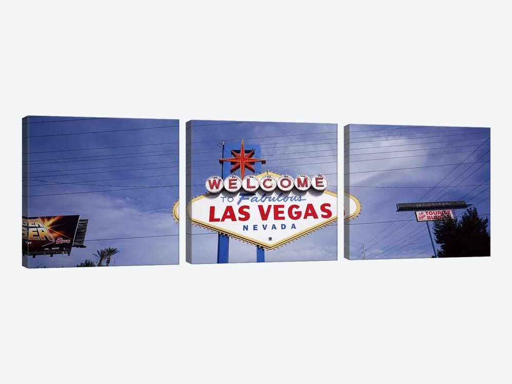 Low angle view of Welcome sign, Las Vegas, Nevada, USA 3-piece Canvas Art Print
