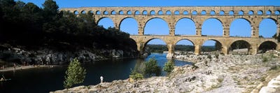 Aqueduct across a river, Pont Du Gard, Nimes, Gard, Languedoc-Rousillon, France by Panoramic Images canvas print