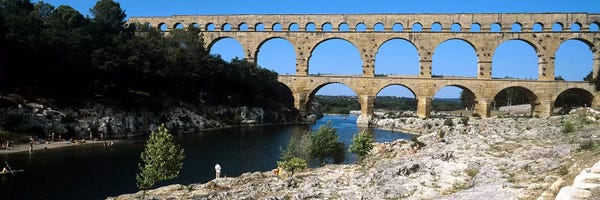 Occitania: Aqueduct across a river, Pont Du Gard, Nimes, Gard, Languedoc-Rousillon, France by Panoramic Images