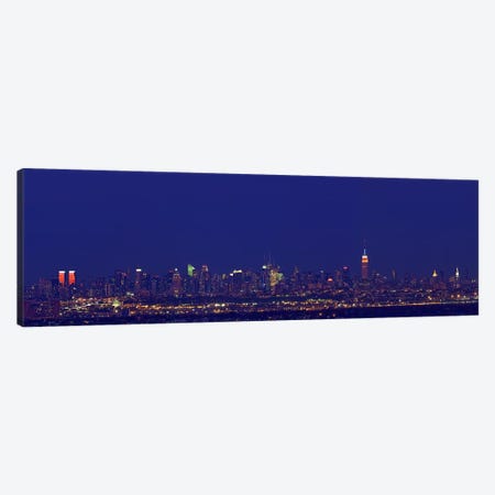 Buildings in a city lit up at night, New York City, New York State, USA Canvas Print #PIM7994} by Panoramic Images Canvas Art