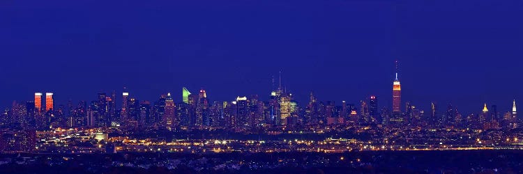 Buildings in a city lit up at night, Upper Manhattan, Manhattan, New York City, New York State, USA