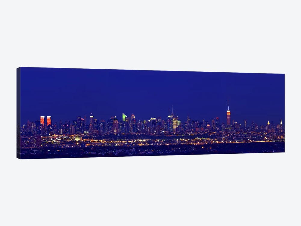 Buildings in a city lit up at night, Upper Manhattan, Manhattan, New York City, New York State, USA by Panoramic Images 1-piece Canvas Artwork