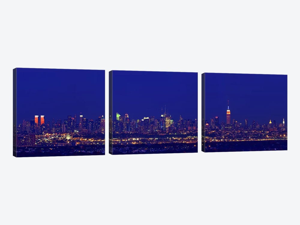 Buildings in a city lit up at night, Upper Manhattan, Manhattan, New York City, New York State, USA by Panoramic Images 3-piece Canvas Art