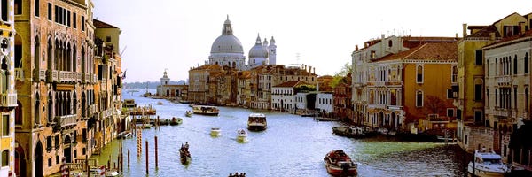 Veneto: Boats in a canal with a church in the backgroundSanta Maria della Salute, Grand Canal, Venice, Veneto, Italy by Panoramic Images