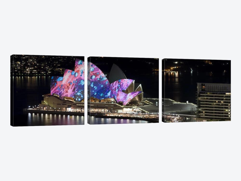 Opera house lit up at night, Sydney Opera House, Sydney, New South Wales, Australia by Panoramic Images 3-piece Canvas Art