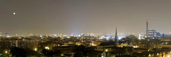Chicago Skylines: Buildings in a city lit up at night, Pilsen, Chicago, Illinois, USA by Panoramic Images