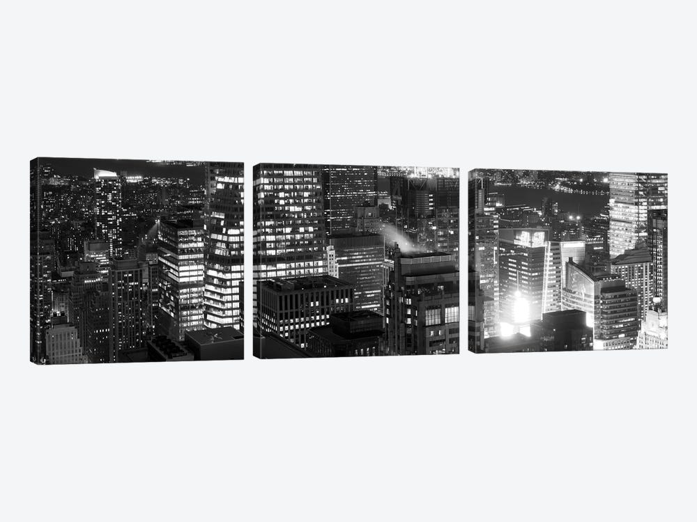 Aerial view of a city at night, Midtown Manhattan, Manhattan, New York City, New York State, USA by Panoramic Images 3-piece Art Print