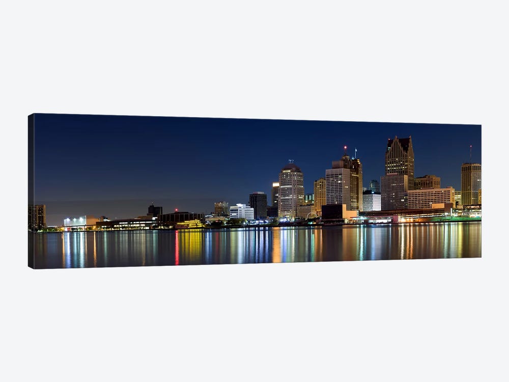 Buildings in a city lit up at dusk, Detroit River, Detroit, Michigan, USA by Panoramic Images 1-piece Canvas Art Print