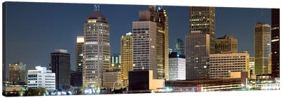 Buildings in a city lit up at night, Detroit River, Detroit, Michigan, USA Canvas Art Print - Michigan Art