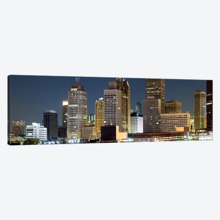Buildings in a city lit up at night, Detroit River, Detroit, Michigan, USA Canvas Print #PIM8027} by Panoramic Images Canvas Artwork