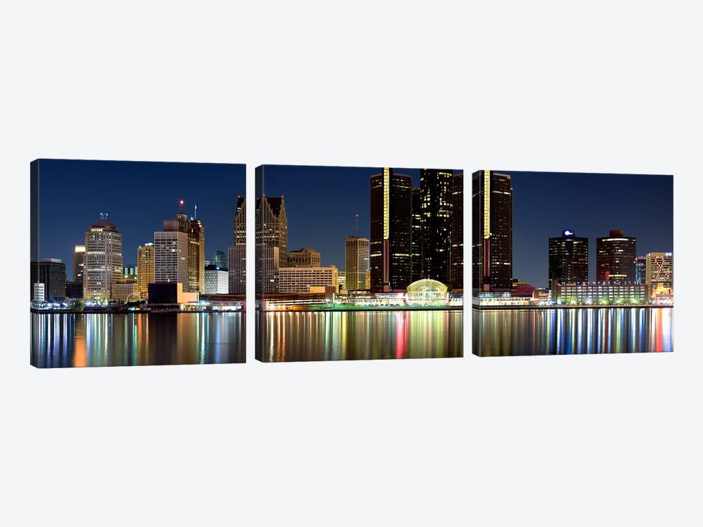 Buildings in a city lit up at night, Detroit River, Detroit, Michigan, USA #2 by Panoramic Images 3-piece Art Print