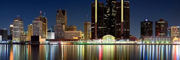 Detroit: Buildings in a city lit up at night, Detroit River, Detroit, Michigan, USA #2 by Panoramic Images