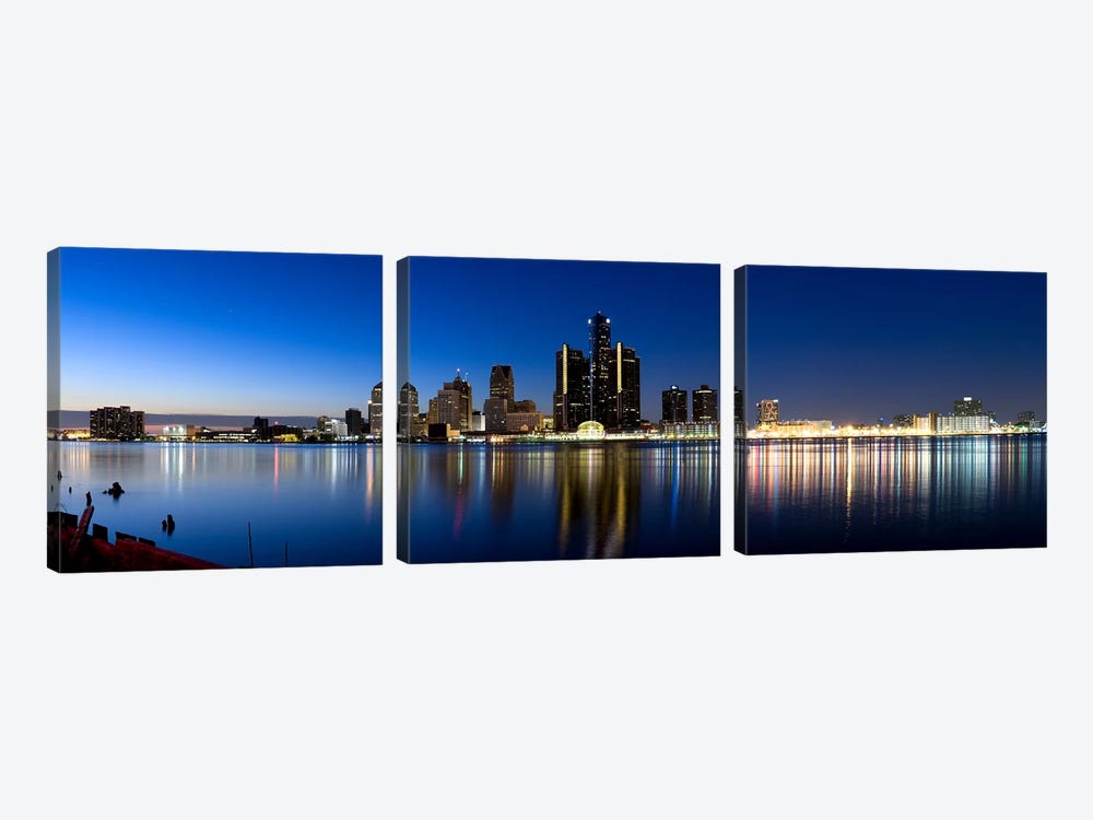 Buildings in a city lit up at dusk, Detroit River, Detroit, Michigan, USA #2 by Panoramic Images 3-piece Canvas Artwork