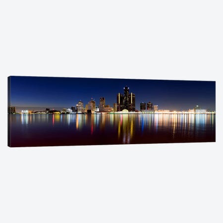 Buildings in a city lit up at duskDetroit River, Detroit, Michigan, USA Canvas Print #PIM8030} by Panoramic Images Canvas Artwork