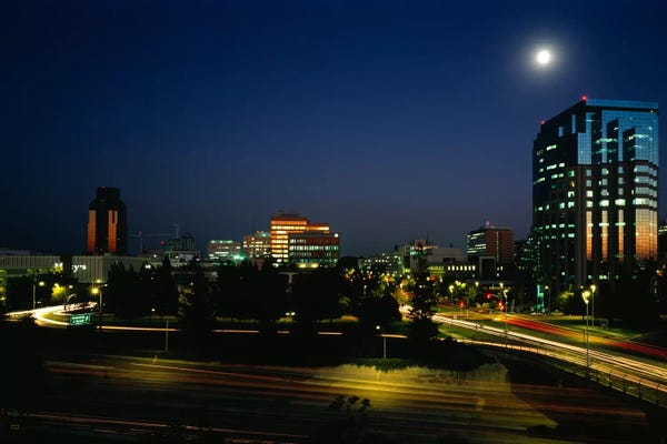 Buildings lit up at night, Sacramento, California, USA