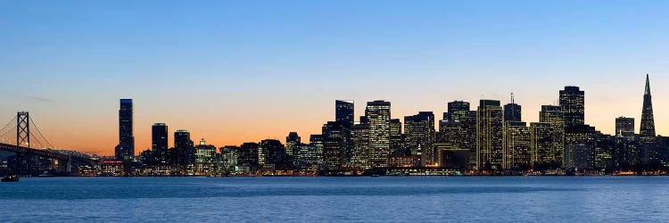 City skyline and a bridge at dusk, Bay Bridge, San Francisco, California, USA 2010