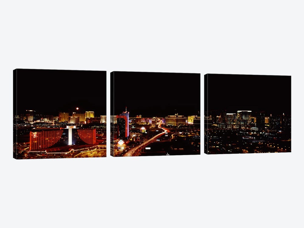 City lit up at night, Las Vegas, Nevada, USA 2010 #2 by Panoramic Images 3-piece Canvas Print