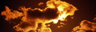 Clouds at sunset by Panoramic Images framed canvas print