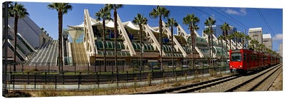 MTS commuter train moving on tracks, San Diego Convention Center, San Diego, California, USA Canvas Art Print - Railroads