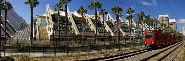 San Diego: MTS commuter train moving on tracks, San Diego Convention Center, San Diego, California, USA by Panoramic Images