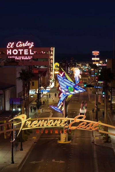 Signs: Neon casino signs lit up at dusk, El Cortez, Fremont Street, The Strip, Las Vegas, Nevada, USA by Panoramic Images