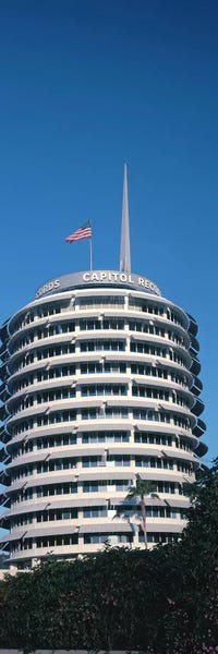Los Angeles: Low angle view of an office building, Capitol Records Building, City of Los Angeles, California, USA by Panoramic Images