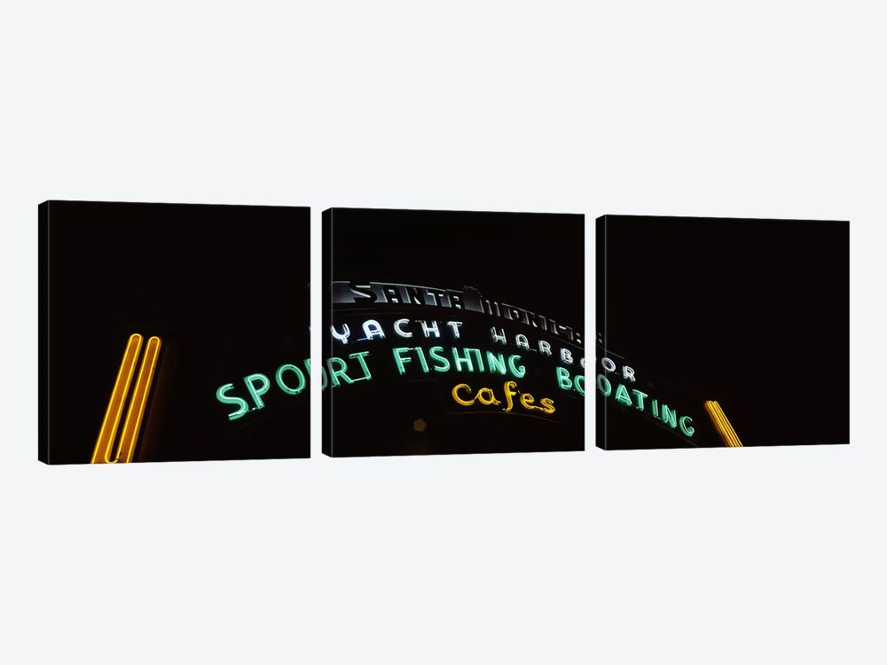 Low angle view of a neon signboard, Santa Monica Pier, Santa Monica, Los Angeles County, California, USA by Panoramic Images 3-piece Art Print
