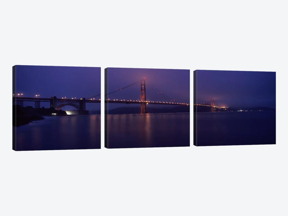 Suspension bridge lit up at dawn viewed from fishing pier, Golden Gate Bridge, San Francisco Bay, San Francisco, California, USA by Panoramic Images 3-piece Canvas Wall Art