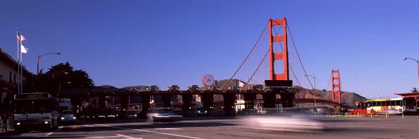 Golden Gate Bridge: Toll booth with a suspension bridge in the background, Golden Gate Bridge, San Francisco Bay, San Francisco, California, USA by Panoramic Images