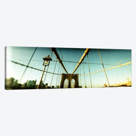 Suspension bridge with a city in the background, Brooklyn Bridge, Manhattan, New York City, New York State, USA Canvas Print #PIM8429} by Panoramic Images Art Print