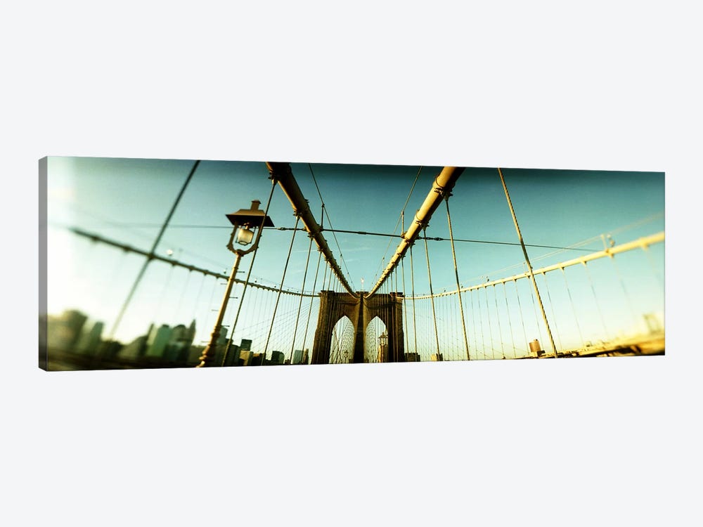 Suspension bridge with a city in the background, Brooklyn Bridge, Manhattan, New York City, New York State, USA by Panoramic Images 1-piece Canvas Art Print
