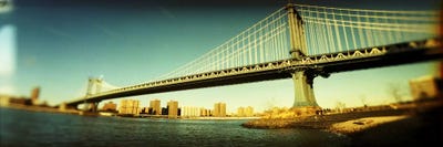 Suspension bridge with a city in the backgroundBrooklyn Bridge, Manhattan, New York City, New York State, USA by Panoramic Images canvas print