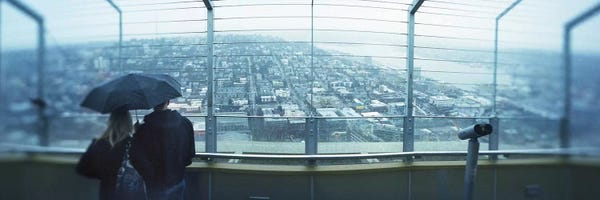 Seattle: Couple viewing a city from the Space Needle, Queen Anne Hill, Seattle, Washington State, USA by Panoramic Images
