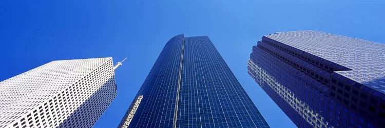 Low angle view of skyscrapers against blue sky, Houston, Texas, USA