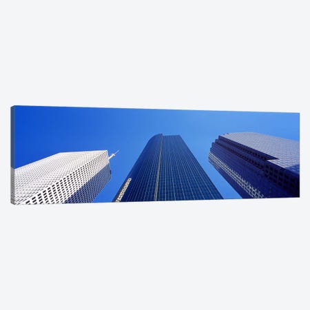 Low angle view of skyscrapers against blue sky, Houston, Texas, USA Canvas Print #PIM8491} by Panoramic Images Canvas Wall Art