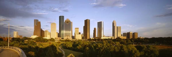 Houston Skylines: Skyscrapers against cloudy sky, Houston, Texas, USA by Panoramic Images